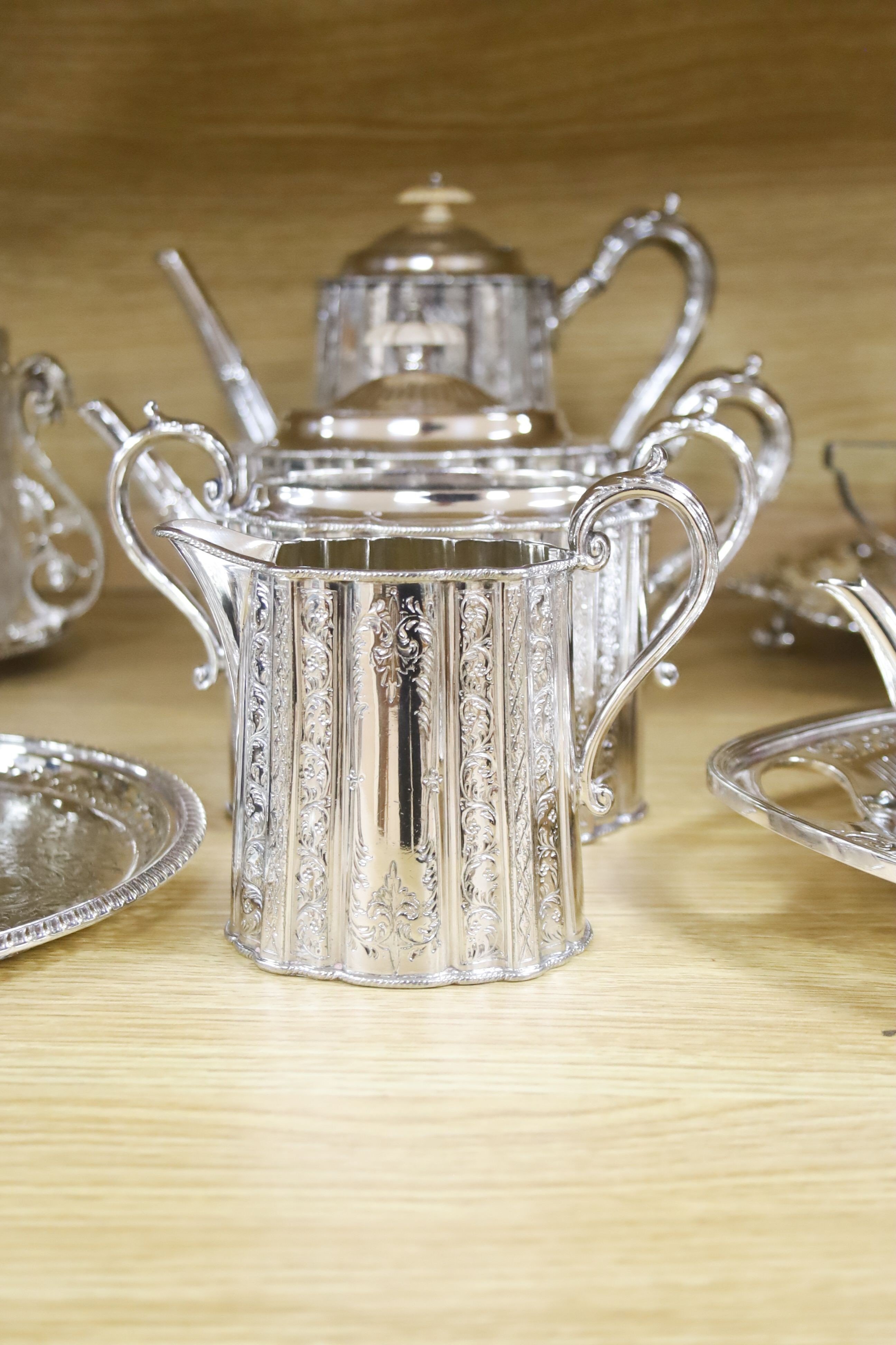 A Victorian cut glass and electroplate biscuit box and other plated wares